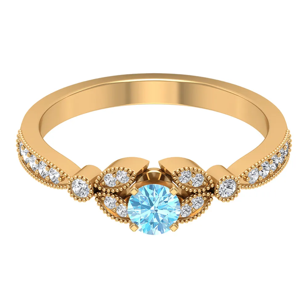 1/2 CT Aquamarine and Diamond Engagement Ring