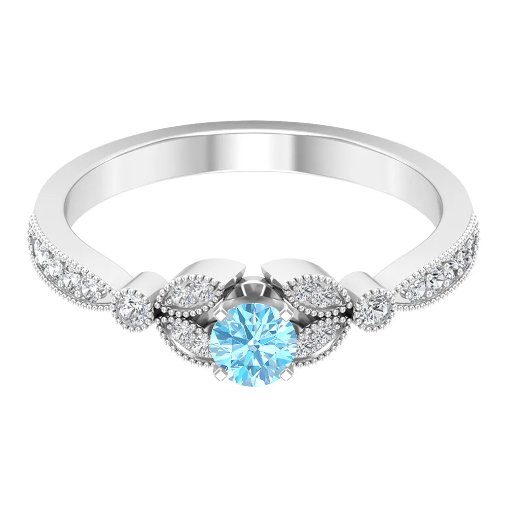 1/2 CT Aquamarine and Diamond Engagement Ring