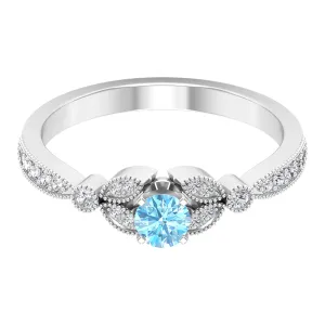 1/2 CT Aquamarine and Diamond Engagement Ring