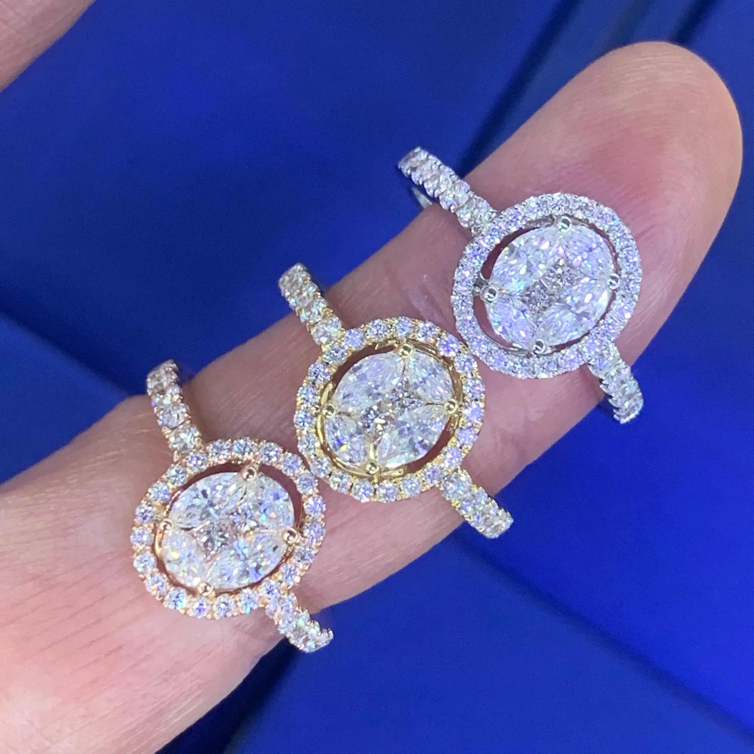 18k Gold and Diamond Oval-shaped Engagement Ring with a Halo