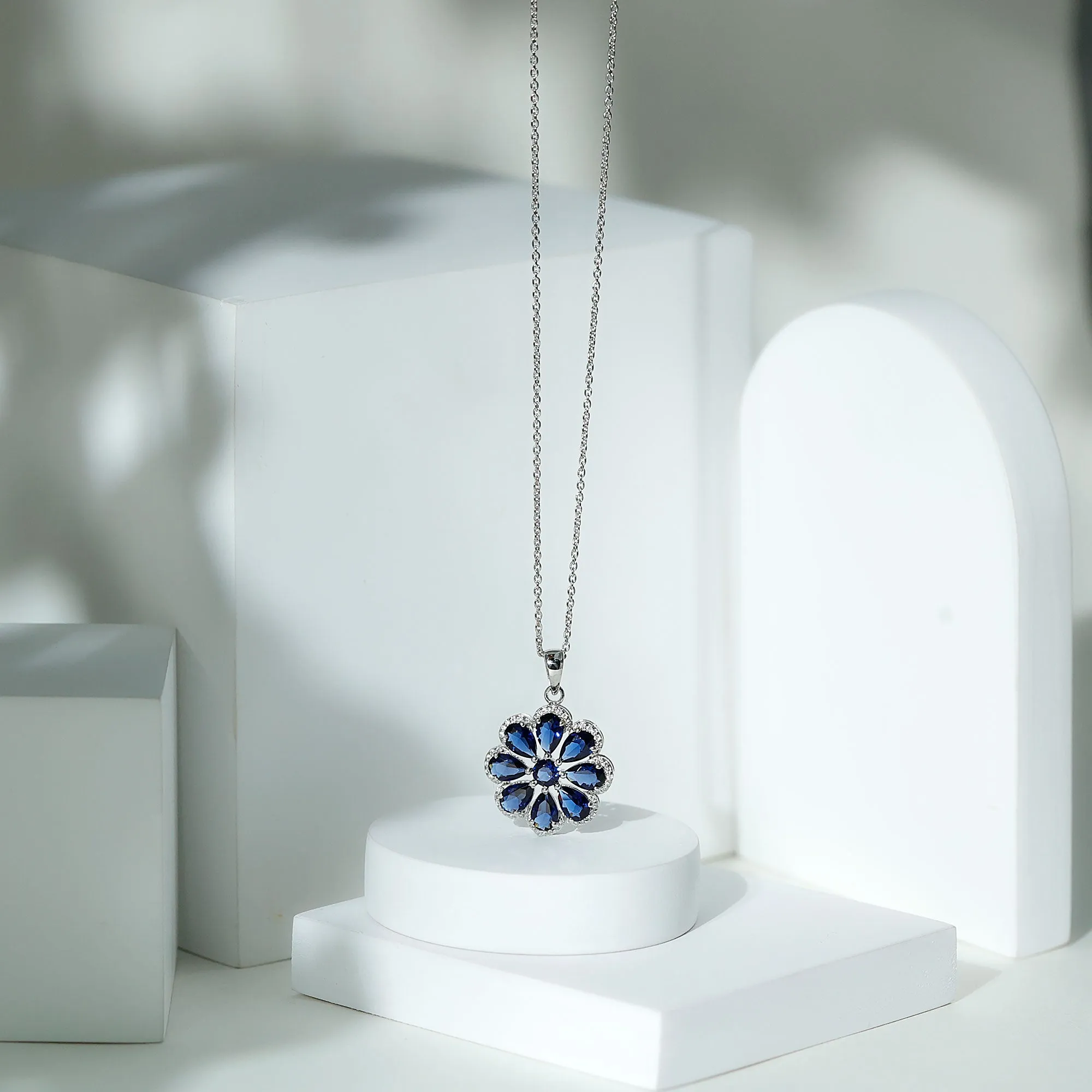 4.5 CT Created Blue Sapphire Flower Pendant with Moissanite Halo