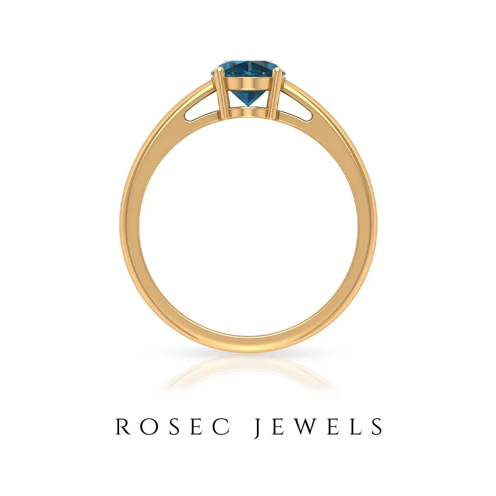 8X6 MM Oval Cut London Blue Topaz Solitaire and Gold Engagement Ring