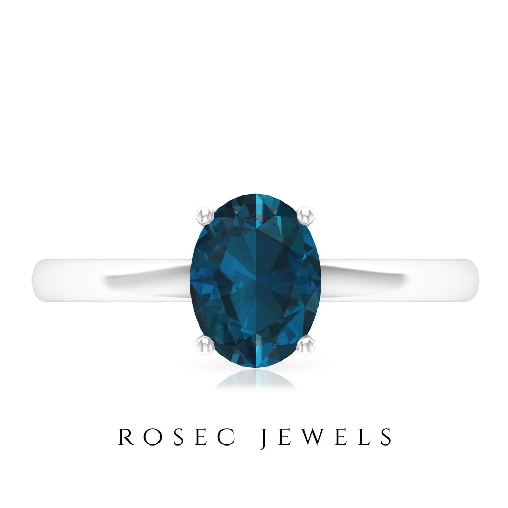 8X6 MM Oval Cut London Blue Topaz Solitaire and Gold Engagement Ring