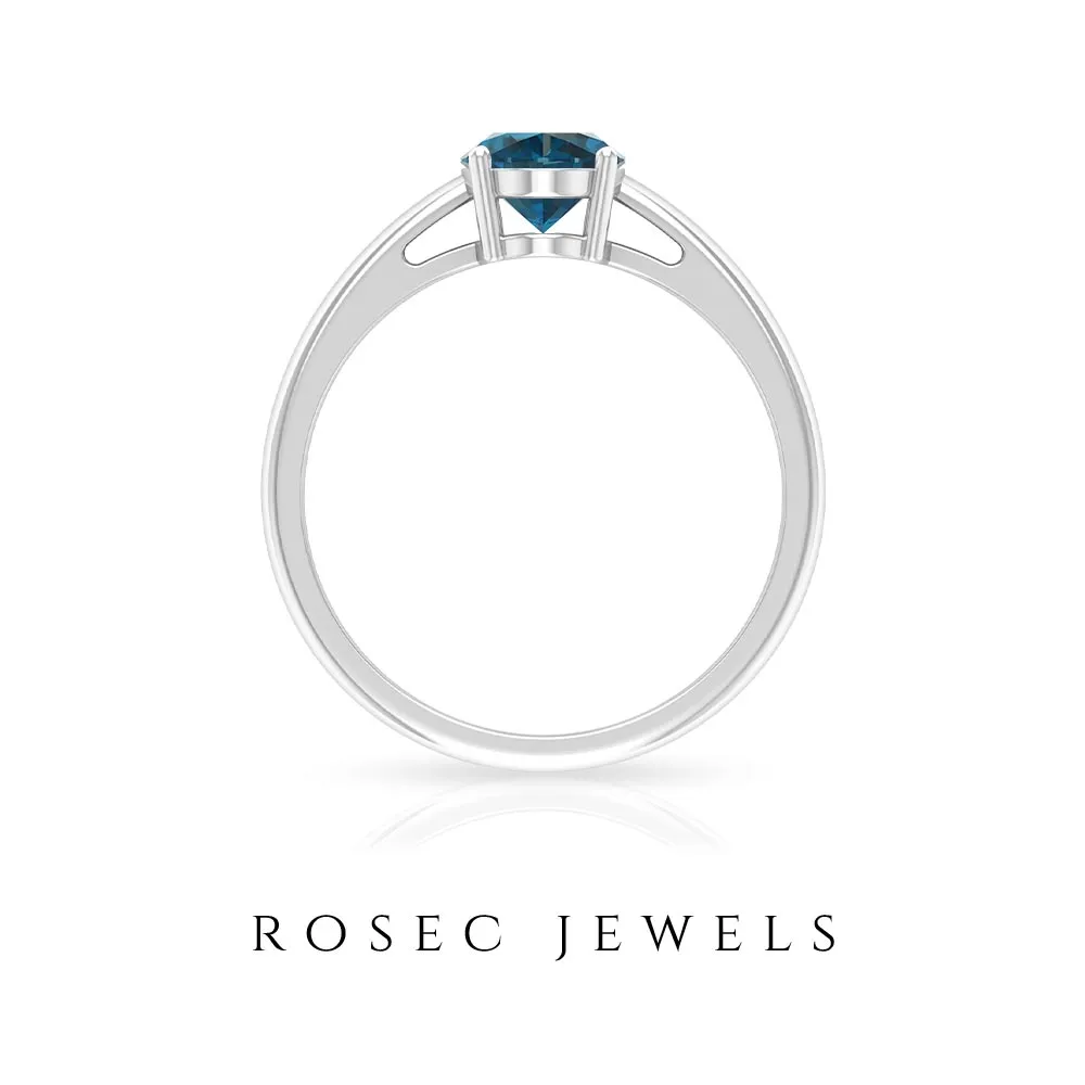 8X6 MM Oval Cut London Blue Topaz Solitaire and Gold Engagement Ring